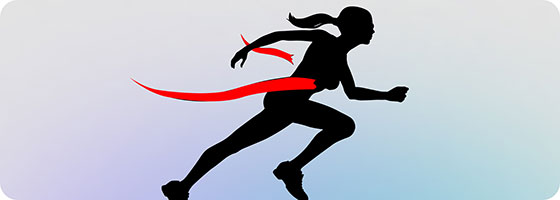 blind female runner crossing finish line ribbon