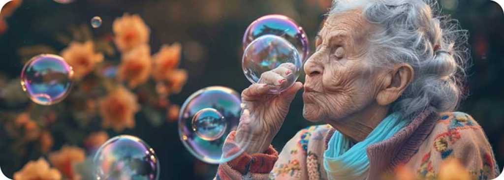older woman blowing bubbles